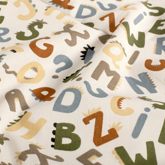 Popeline de coton Lettrosaure